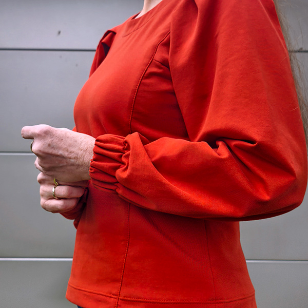 ALIRA 36 Rot Gummiband Am Ärmel Detail